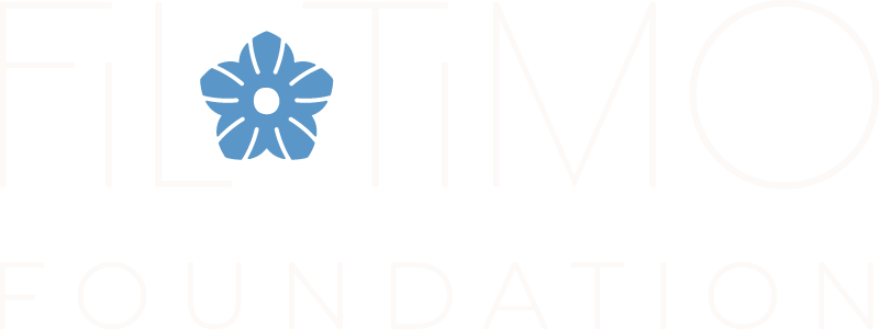 FiloTimo Foundation Logo - Off white sans-serif type with blue flower as first letter o