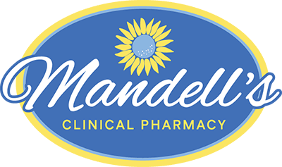 Mandells Logo - White script type over yellow sans-serif type with sunflower illustration above all in blue oval with yellow border